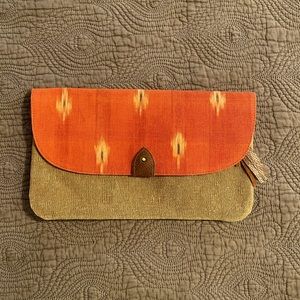 Orange and tan casual clutch